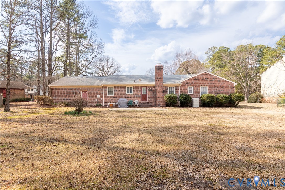 3317 Hastings Road Petersburg, VA 23805 - Photo 21 of 25 a front view of a house with a yard and garage