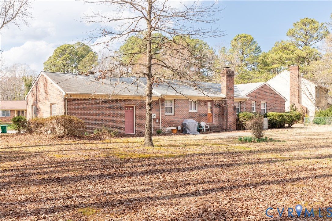 3317 Hastings Road Petersburg, VA 23805 - Photo 22 of 25 a view of a house with a yard and garage
