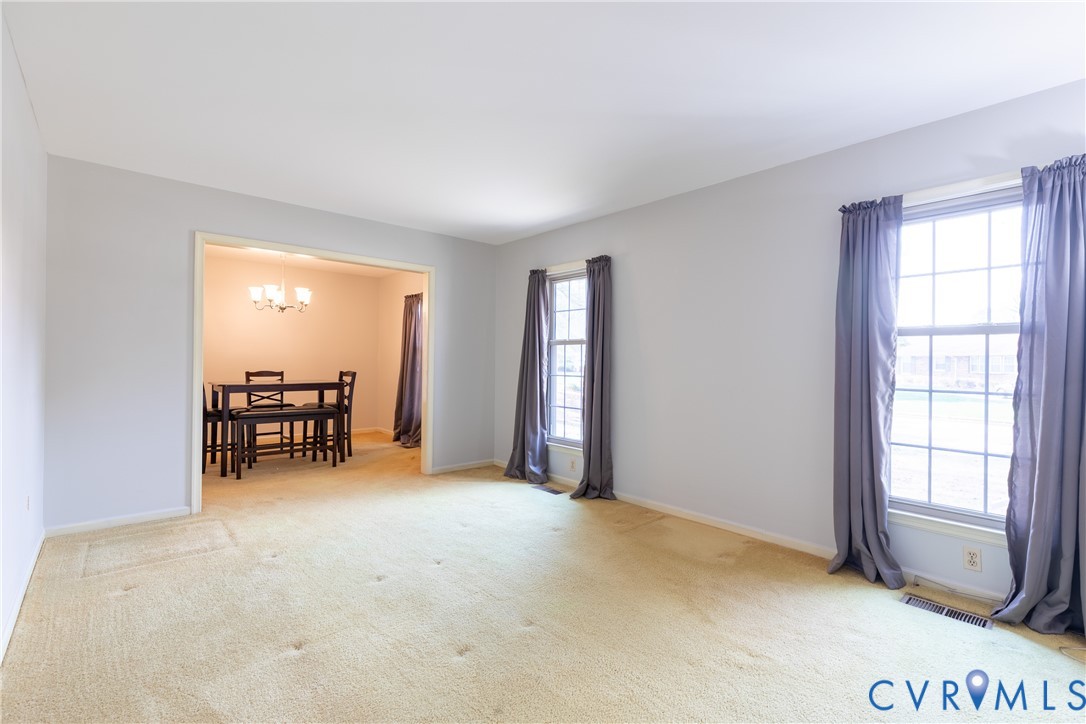 3317 Hastings Road Petersburg, VA 23805 - Photo 5 of 25 a view of an empty room with a window