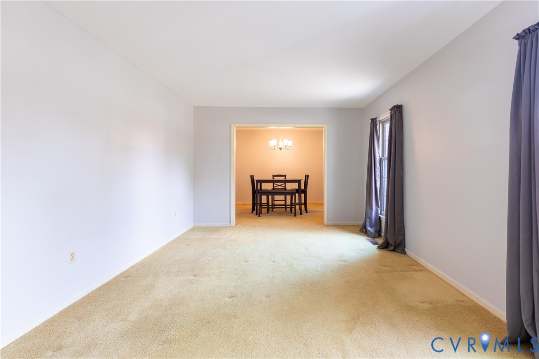 3317 Hastings Road Petersburg, VA 23805 - Photo 6 of 25 a view of a room with furniture and a window