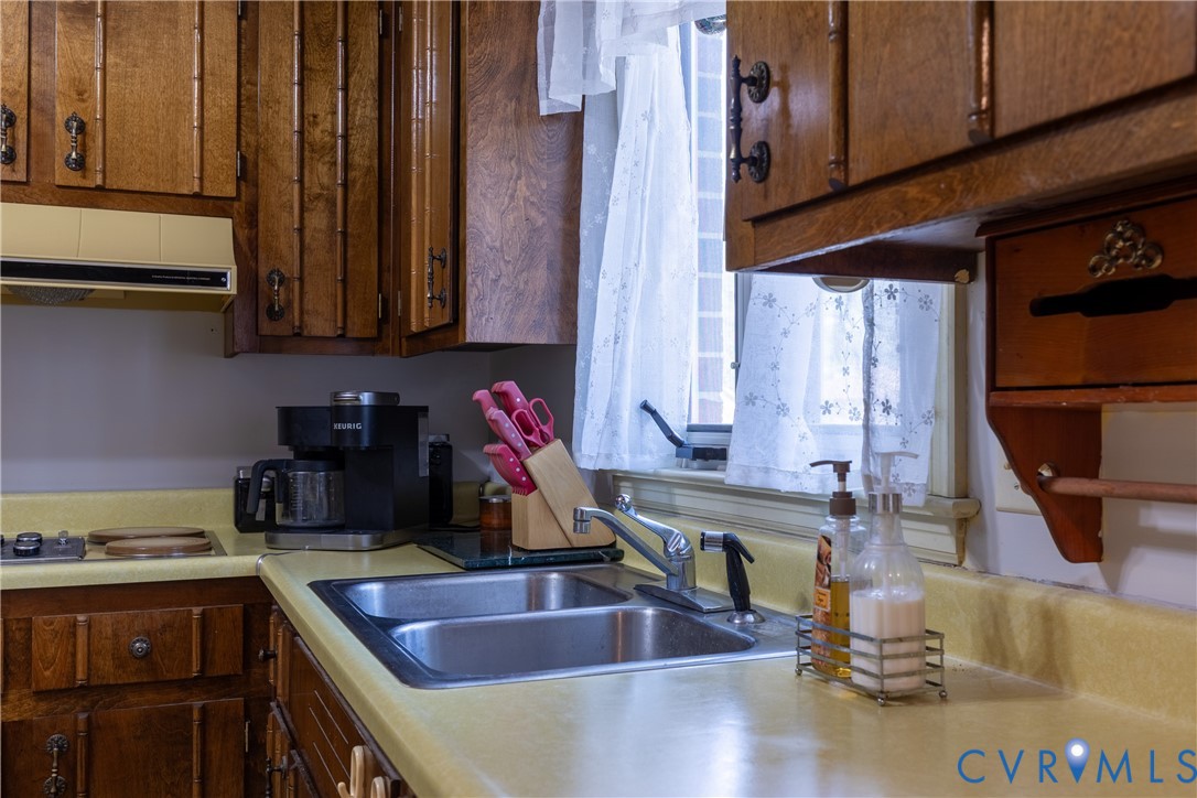 3317 Hastings Road Petersburg, VA 23805 - Photo 10 of 25 a kitchen with sink and cabinets