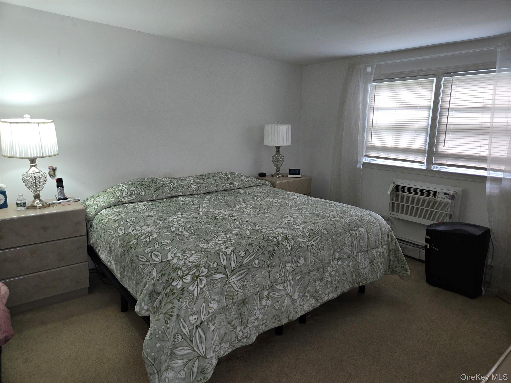 810 Fenimore Road Mamaroneck, NY 10543 - Photo 19 of 33 a bedroom with a bed and window