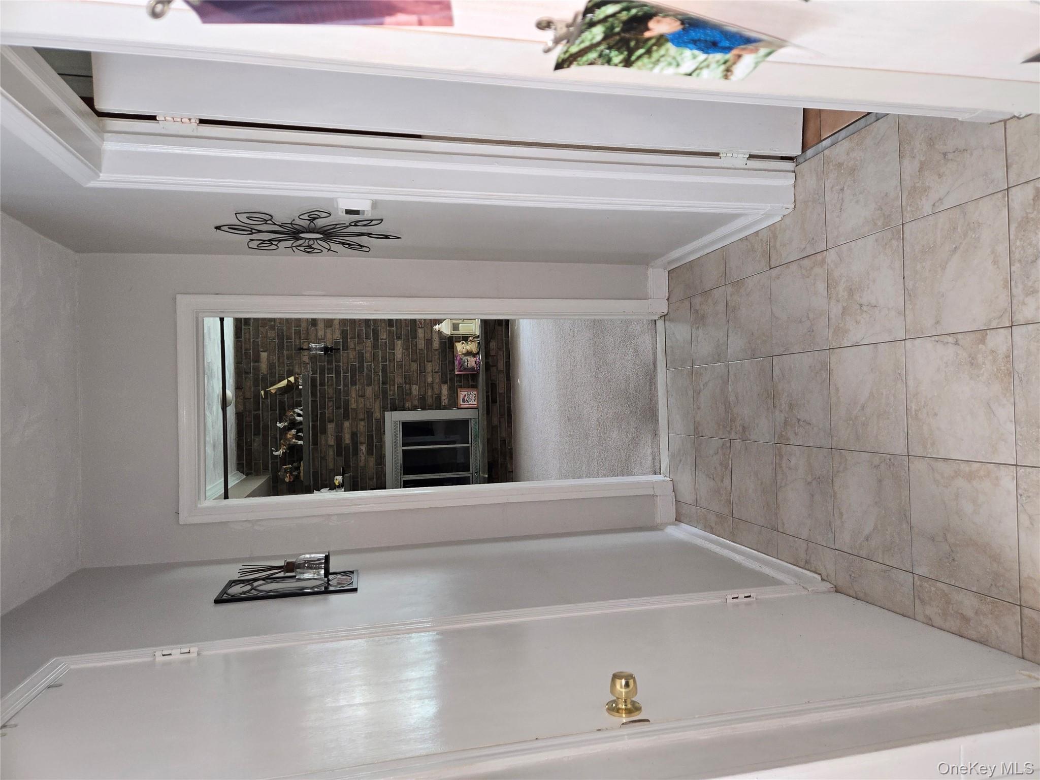 810 Fenimore Road Mamaroneck, NY 10543 - Photo 4 of 33 a view of livingroom with hardwood floor and a ceiling fan