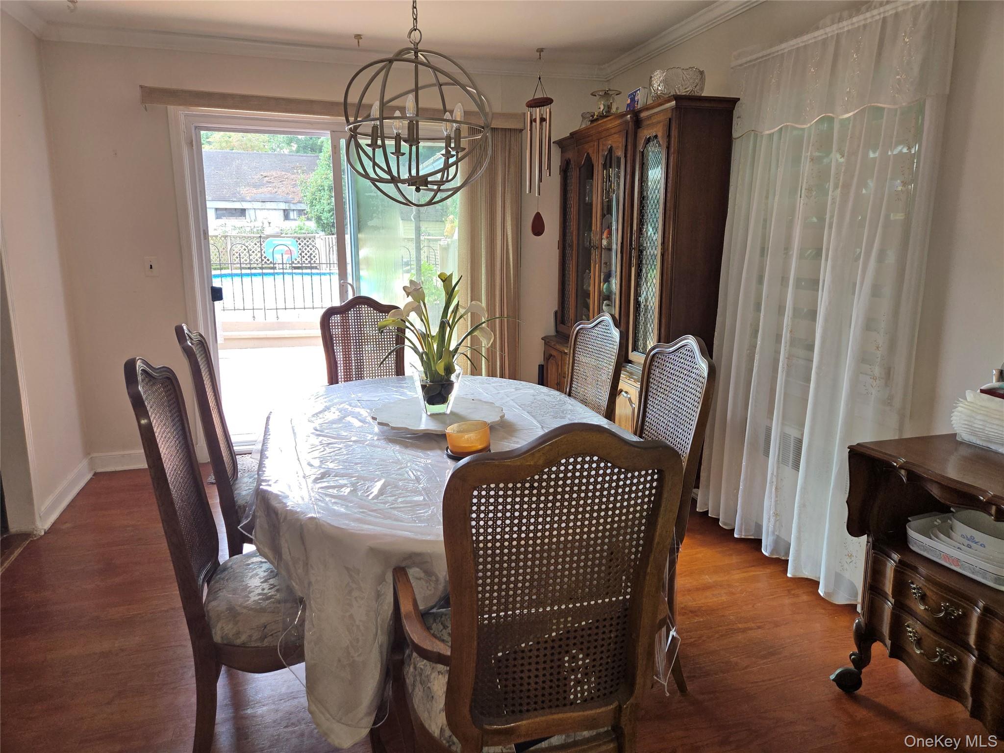 810 Fenimore Road Mamaroneck, NY 10543 - Photo 8 of 33 a view of a dining room with furniture window and outside view