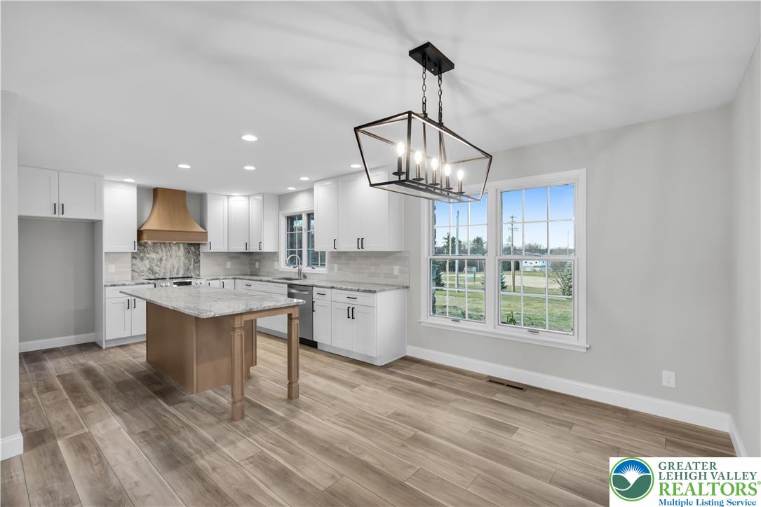 670 Cider Press Road Easton, PA 18042 - Photo 11 of 48 a view of a kitchen with a sink stainless steel appliances and cabinets