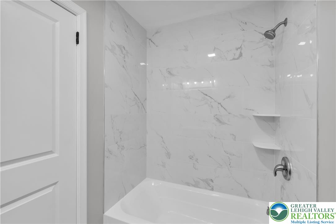 670 Cider Press Road Easton, PA 18042 - Photo 26 of 48 a bathroom with a bathtub and shower