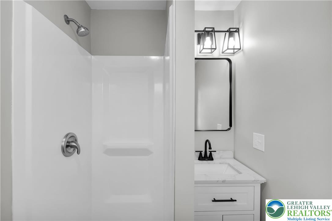 670 Cider Press Road Easton, PA 18042 - Photo 27 of 48 a bathroom with a sink and a mirror