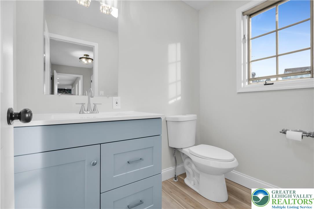 670 Cider Press Road Easton, PA 18042 - Photo 30 of 48 a bathroom with a toilet sink and mirror