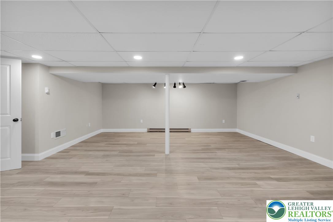 670 Cider Press Road Easton, PA 18042 - Photo 32 of 48 a view of a room with wooden floor