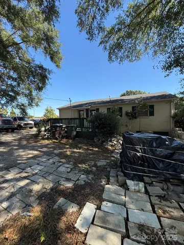 a backyard of a house with lots of green space