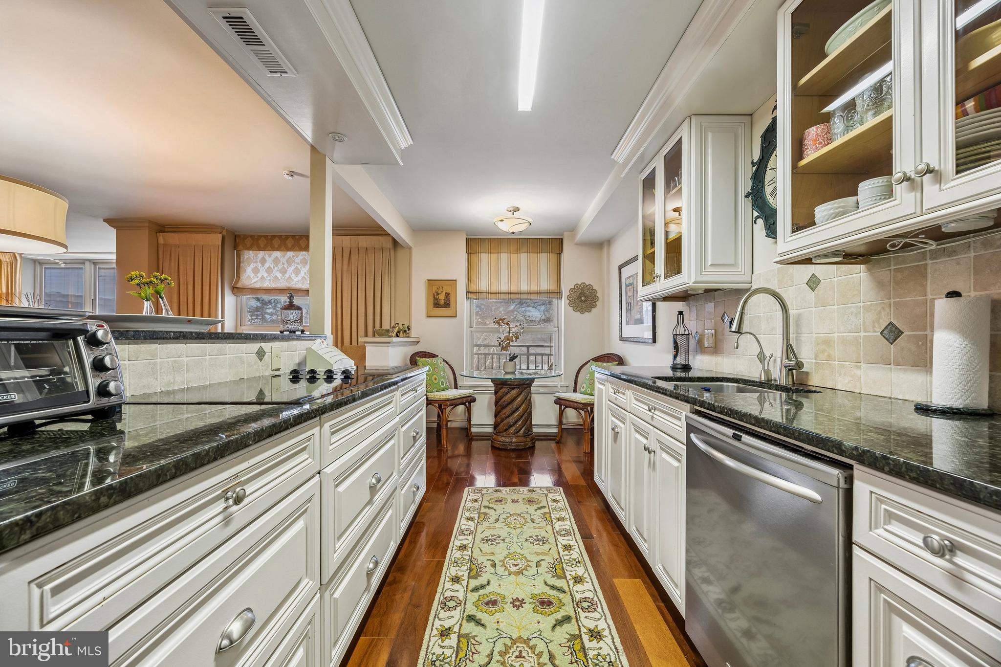 41 Conshohocken State Road, Unit 603 Bala Cynwyd, PA 19004 - Photo 9 of 37 a kitchen with stainless steel appliances granite countertop a stove and a sink
