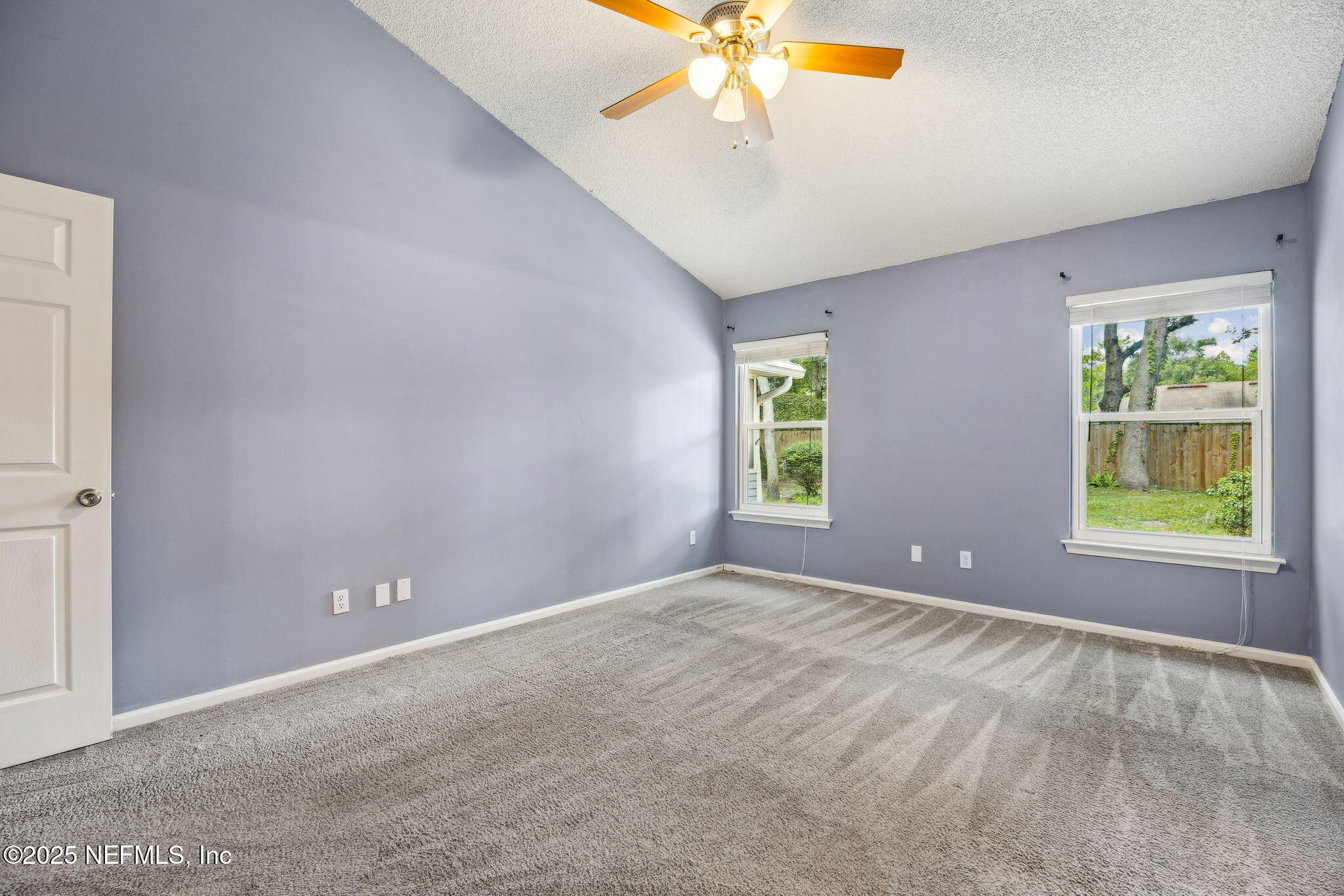 86001 Grant Place Yulee, FL 32097 - Photo 12 of 26 a view of an empty room with a window