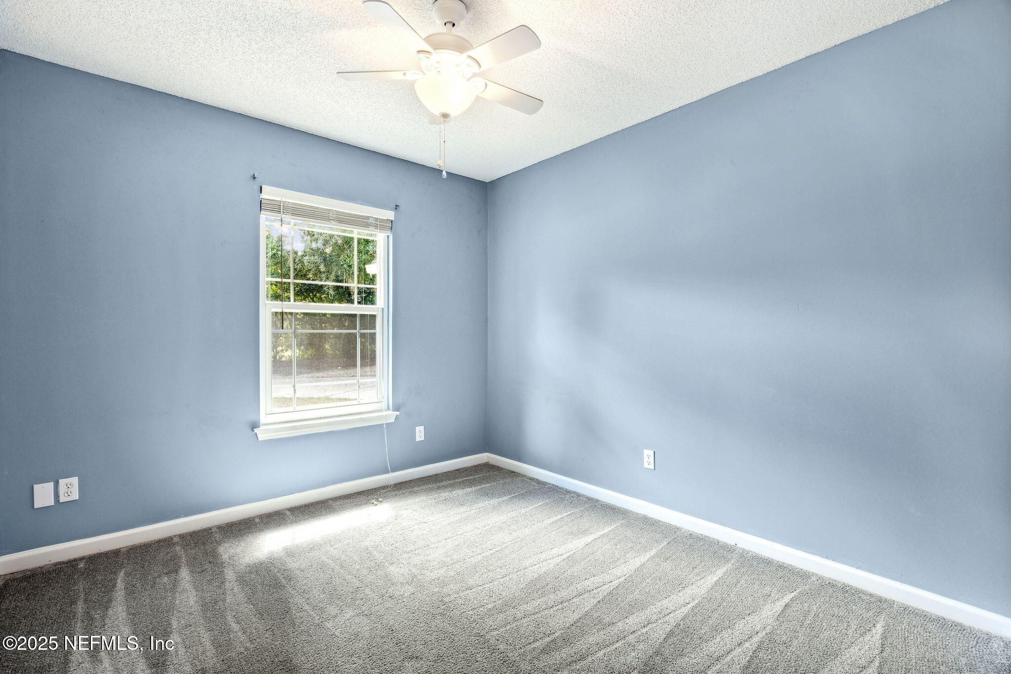 86001 Grant Place Yulee, FL 32097 - Photo 16 of 26 an empty room with a window