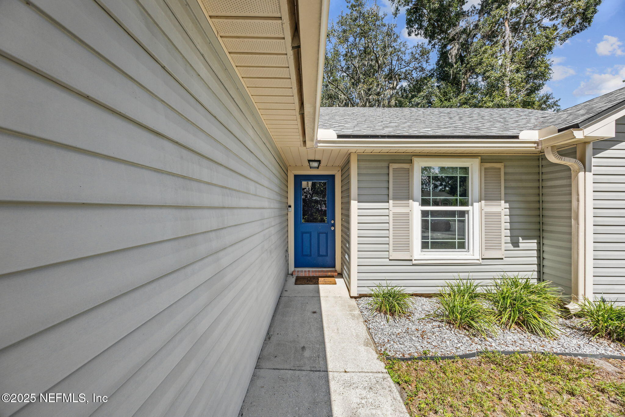 86001 Grant Place Yulee, FL 32097 - Photo 2 of 26 a view of entrance of the house