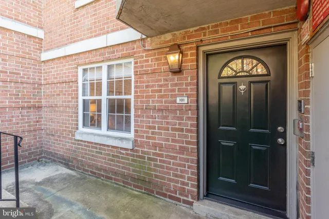 a front view of a house with a glass door