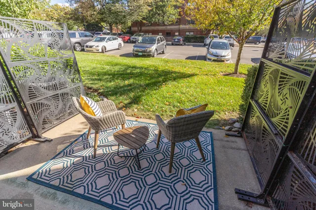 a view of an chairs and tables in the patio