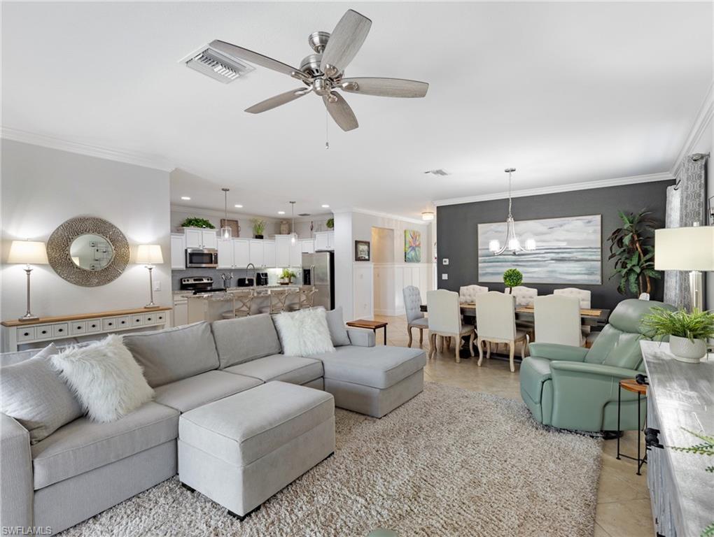 21116 Bella Terra Boulevard Estero, FL 33928 - Photo 14 of 49 a living room with furniture