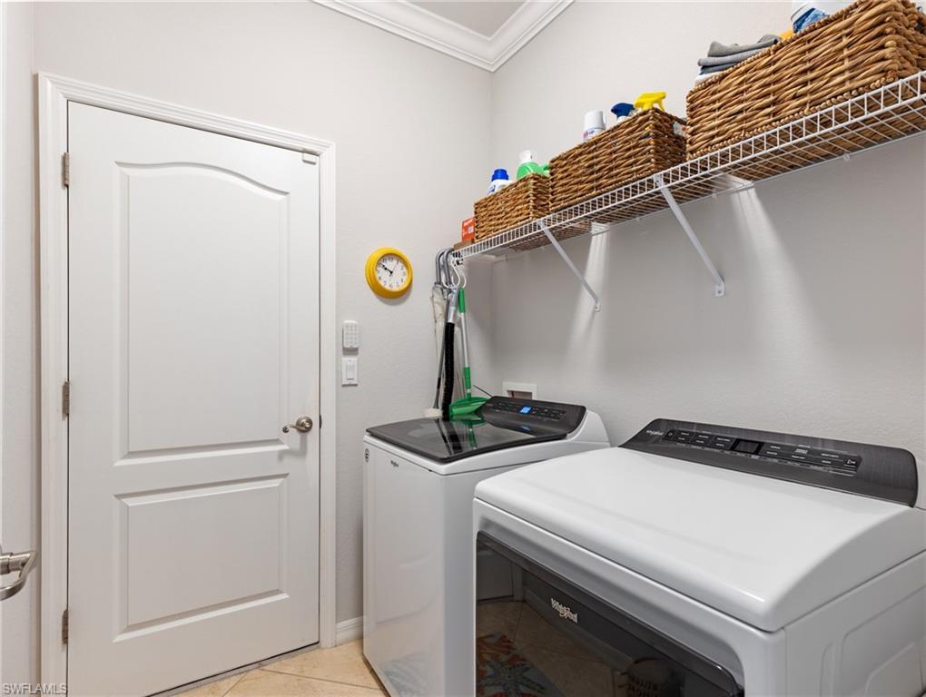 21116 Bella Terra Boulevard Estero, FL 33928 - Photo 30 of 49 a utility room with dryer and washer