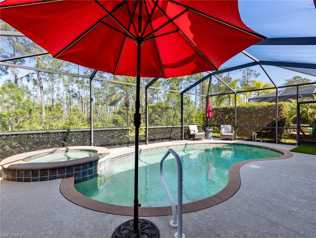 21116 Bella Terra Boulevard Estero, FL 33928 - Photo 33 of 49 a view of a swimming pool with a yard