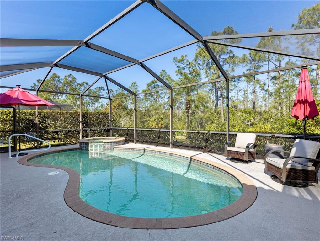 21116 Bella Terra Boulevard Estero, FL 33928 - Photo 34 of 49 a view of a swimming pool with a patio