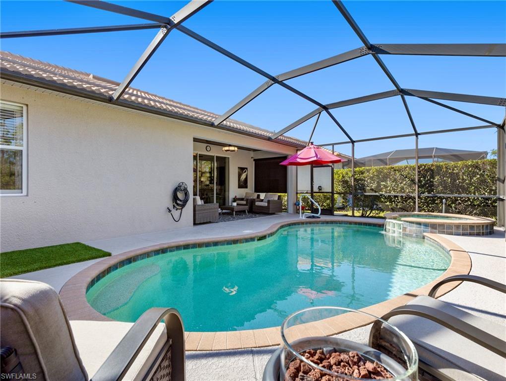 21116 Bella Terra Boulevard Estero, FL 33928 - Photo 35 of 49 a view of a patio with swimming pool
