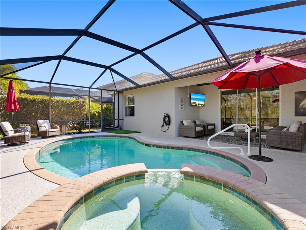 21116 Bella Terra Boulevard Estero, FL 33928 - Photo 37 of 49 a view of a swimming pool with a patio