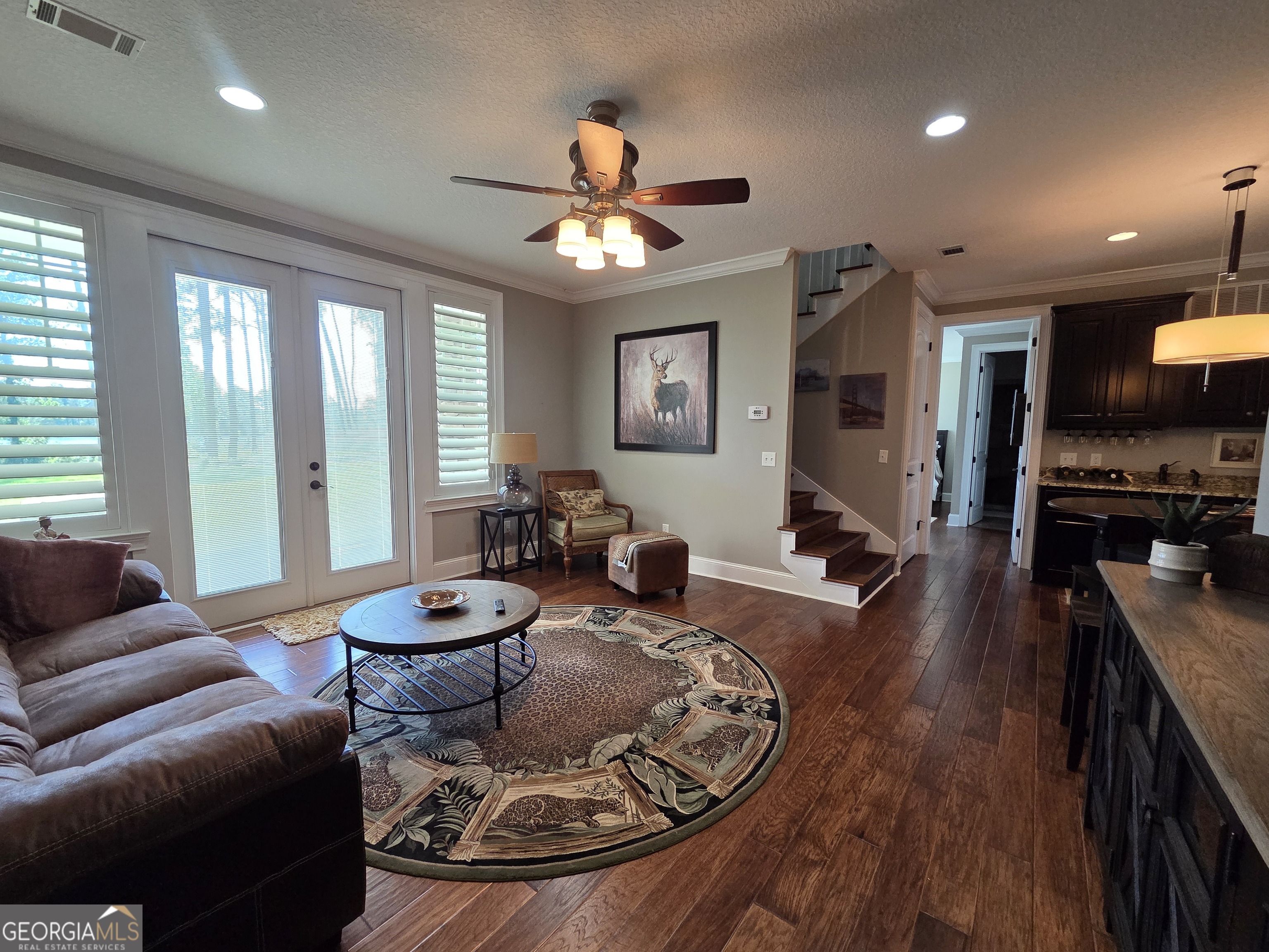 300 Hammond Powell Road Hazlehurst, GA 31539 - Photo 70 of 91 a living room with furniture and a wooden floor