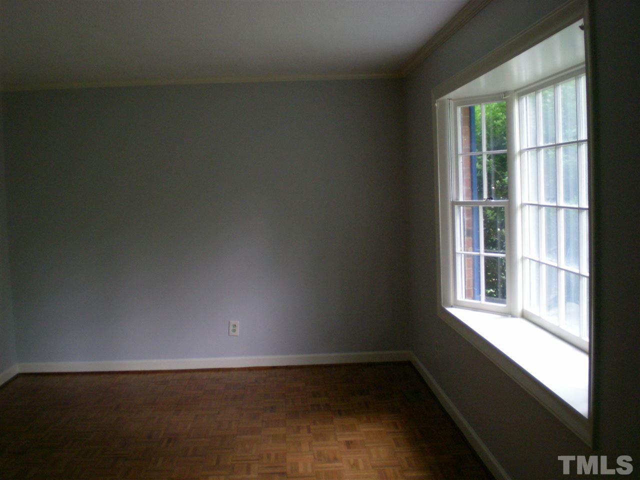 1308 Knights Way Raleigh, NC 27615 - Photo 21 of 25 an empty room with a window