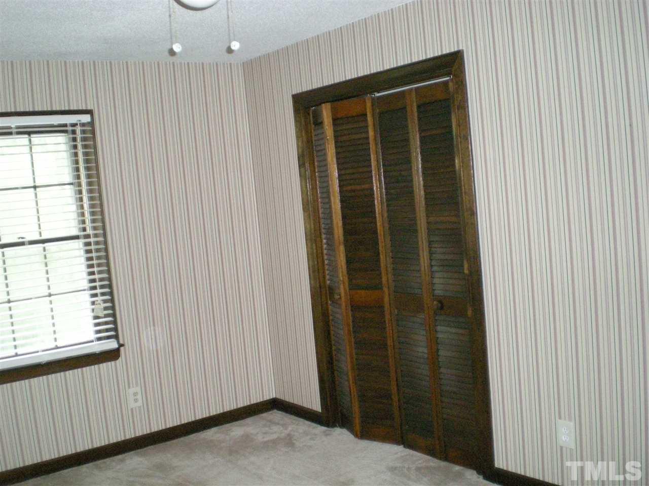 1308 Knights Way Raleigh, NC 27615 - Photo 24 of 25 an entryway with a window