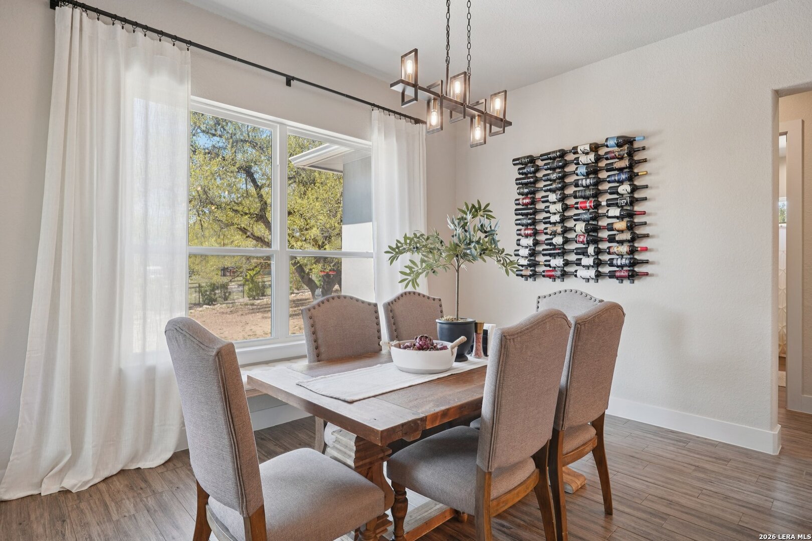 234 Sabella Spring Branch, TX 78070 - Photo 13 of 39 a view of a dining room with furniture window and wooden floor
