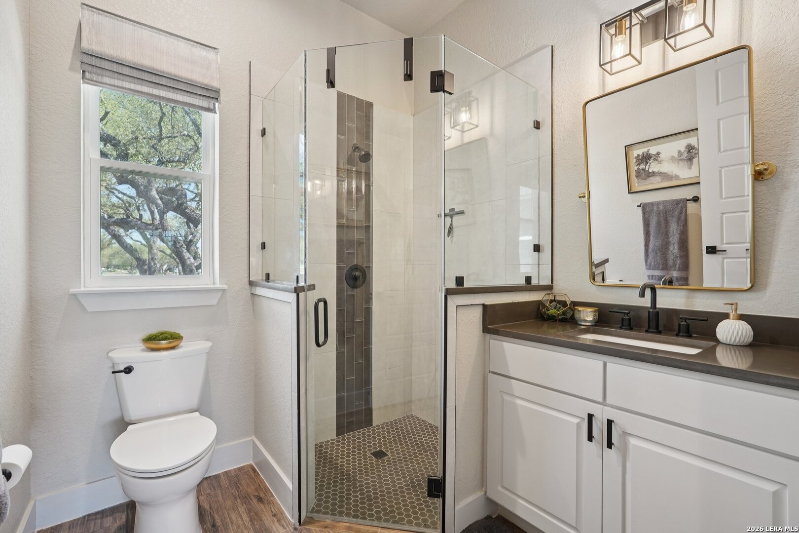 234 Sabella Spring Branch, TX 78070 - Photo 29 of 39 a bathroom with a granite countertop sink toilet and shower