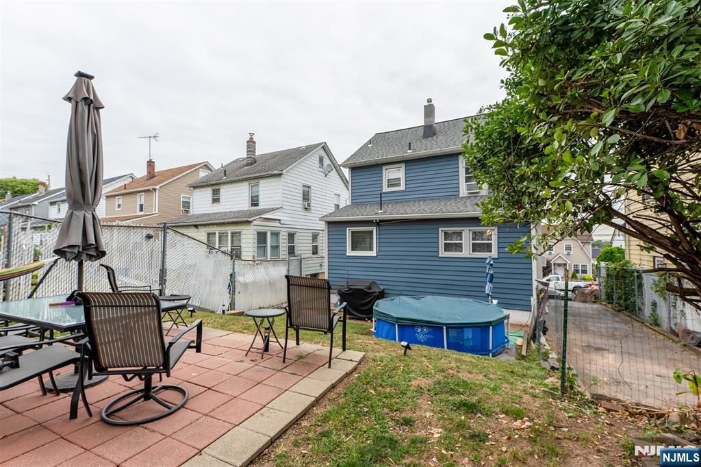 276 East 26th Street Paterson, NJ 07514 - Photo 27 of 30 a view of a chairs and table in the patio