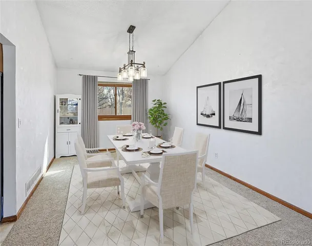 a view of a dining room with furniture