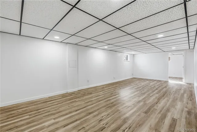 an empty room with a bench