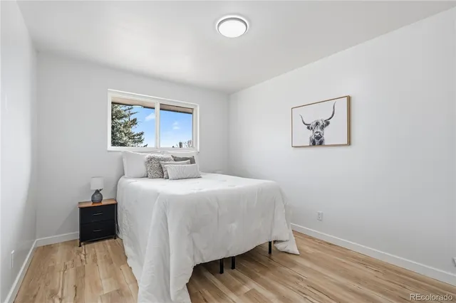 a workspace with furniture and wooden floor