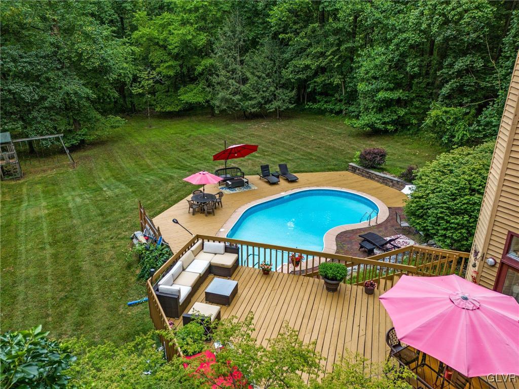 81 Palmer Road Bangor, PA 18013 - Photo 12 of 50 an outdoor space with furniture and umbrella