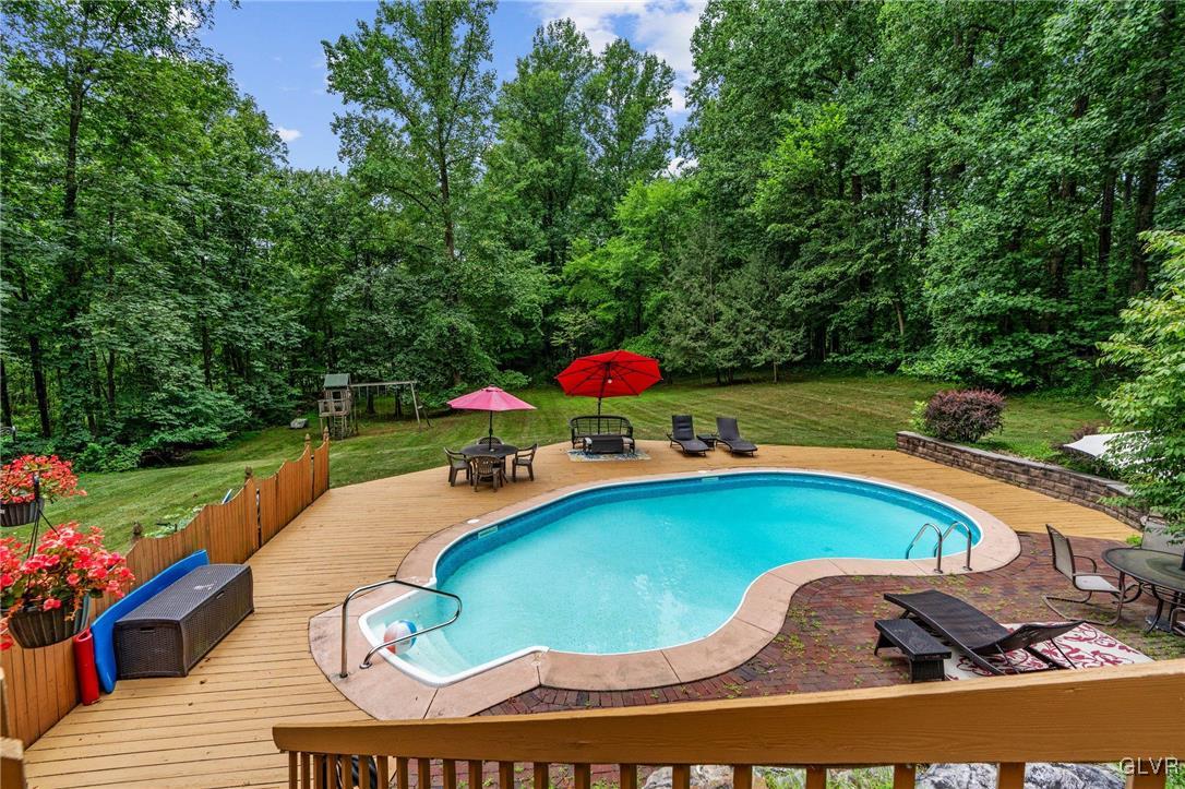 81 Palmer Road Bangor, PA 18013 - Photo 13 of 50 a view of a swimming pool with a yard