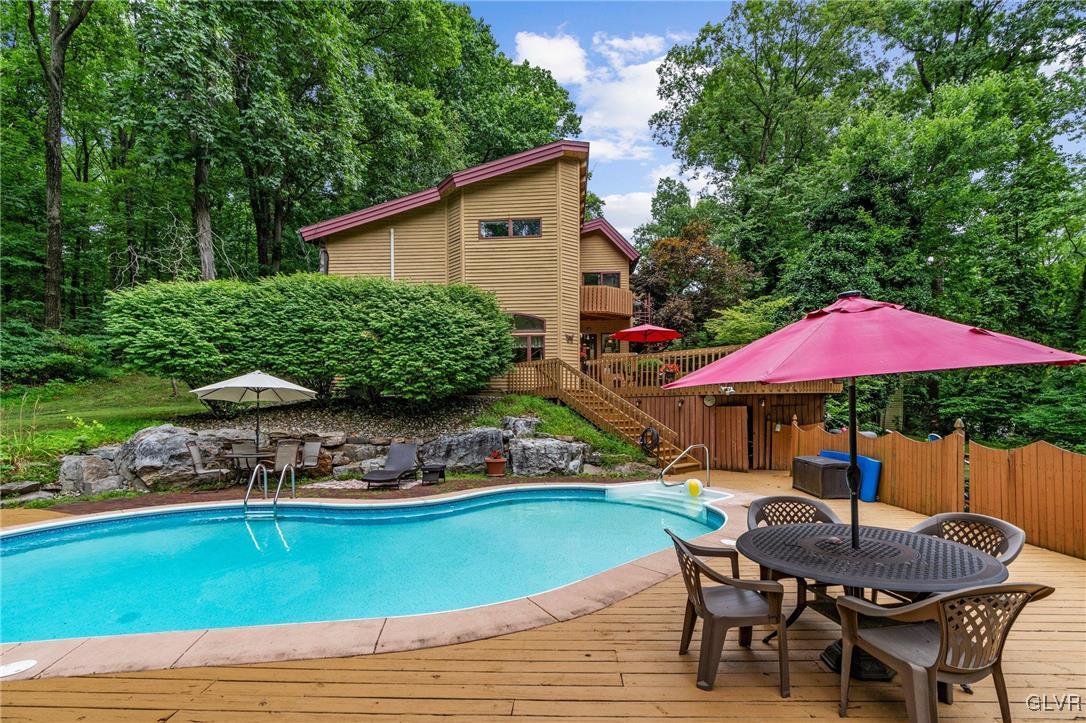 81 Palmer Road Bangor, PA 18013 - Photo 14 of 50 a view of a house with backyard sitting area and furniture