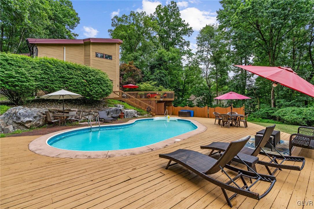 81 Palmer Road Bangor, PA 18013 - Photo 15 of 50 a view of a swimming pool with a patio