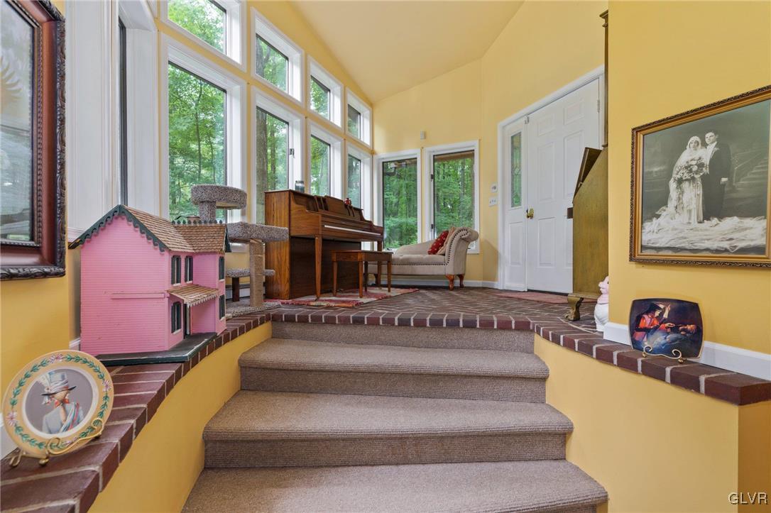 81 Palmer Road Bangor, PA 18013 - Photo 18 of 50 a spacious bedroom with furniture and a large window