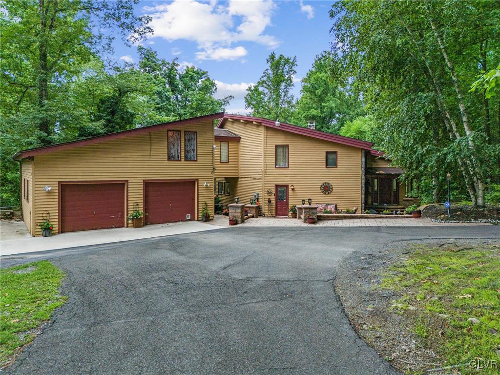 81 Palmer Road Bangor, PA 18013 - Photo 2 of 50 a view of a house with backyard and trees