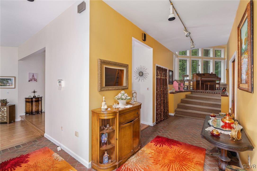 81 Palmer Road Bangor, PA 18013 - Photo 21 of 50 a living room with furniture and a flat screen tv