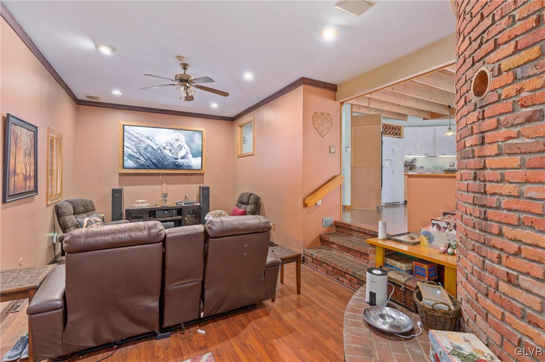 81 Palmer Road Bangor, PA 18013 - Photo 29 of 50 a living room with furniture and a flat screen tv