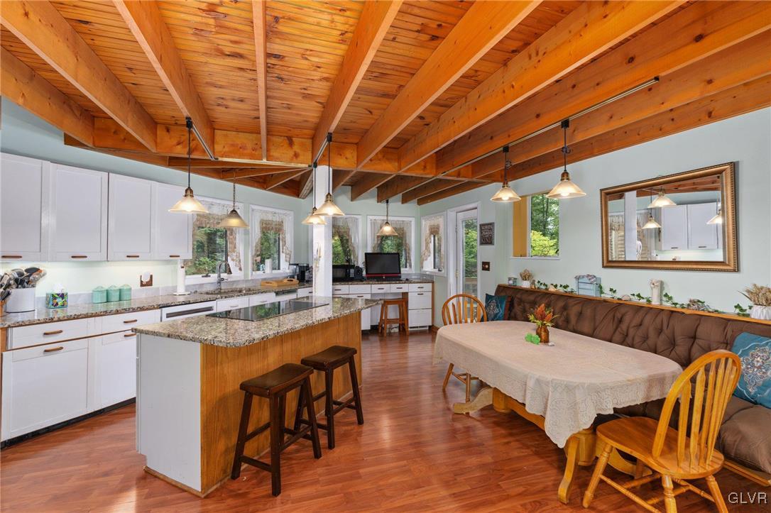 81 Palmer Road Bangor, PA 18013 - Photo 32 of 50 a view of a dining room with furniture window and wooden floor