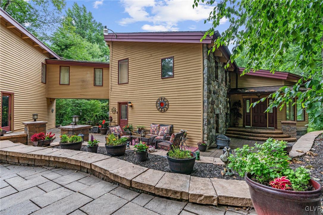 81 Palmer Road Bangor, PA 18013 - Photo 4 of 50 a front view of a house with a yard