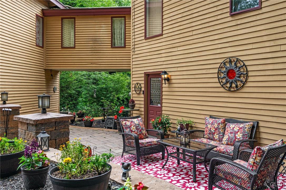 81 Palmer Road Bangor, PA 18013 - Photo 5 of 50 a group of chairs sitting in front of a house