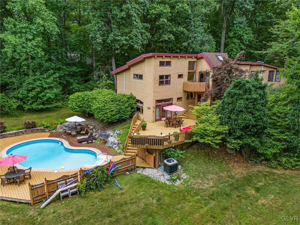 81 Palmer Road Bangor, PA 18013 - Photo 10 of 50 an aerial view of a house with swimming pool garden and patio