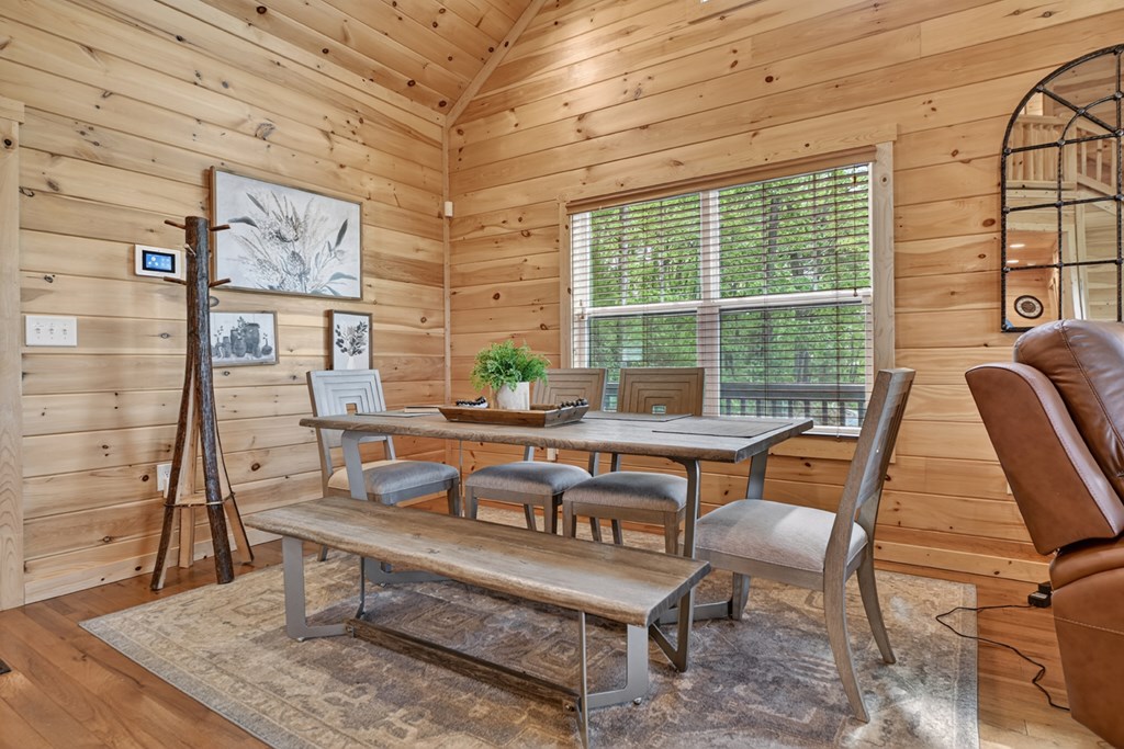 291 Tower Road Mineral Bluff, GA 30559 - Photo 31 of 55 a reading room with furniture a large window and wooden floor