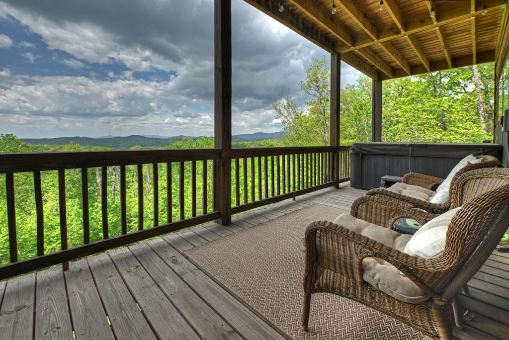 291 Tower Road Mineral Bluff, GA 30559 - Photo 53 of 55 a balcony with furniture and wooden floor