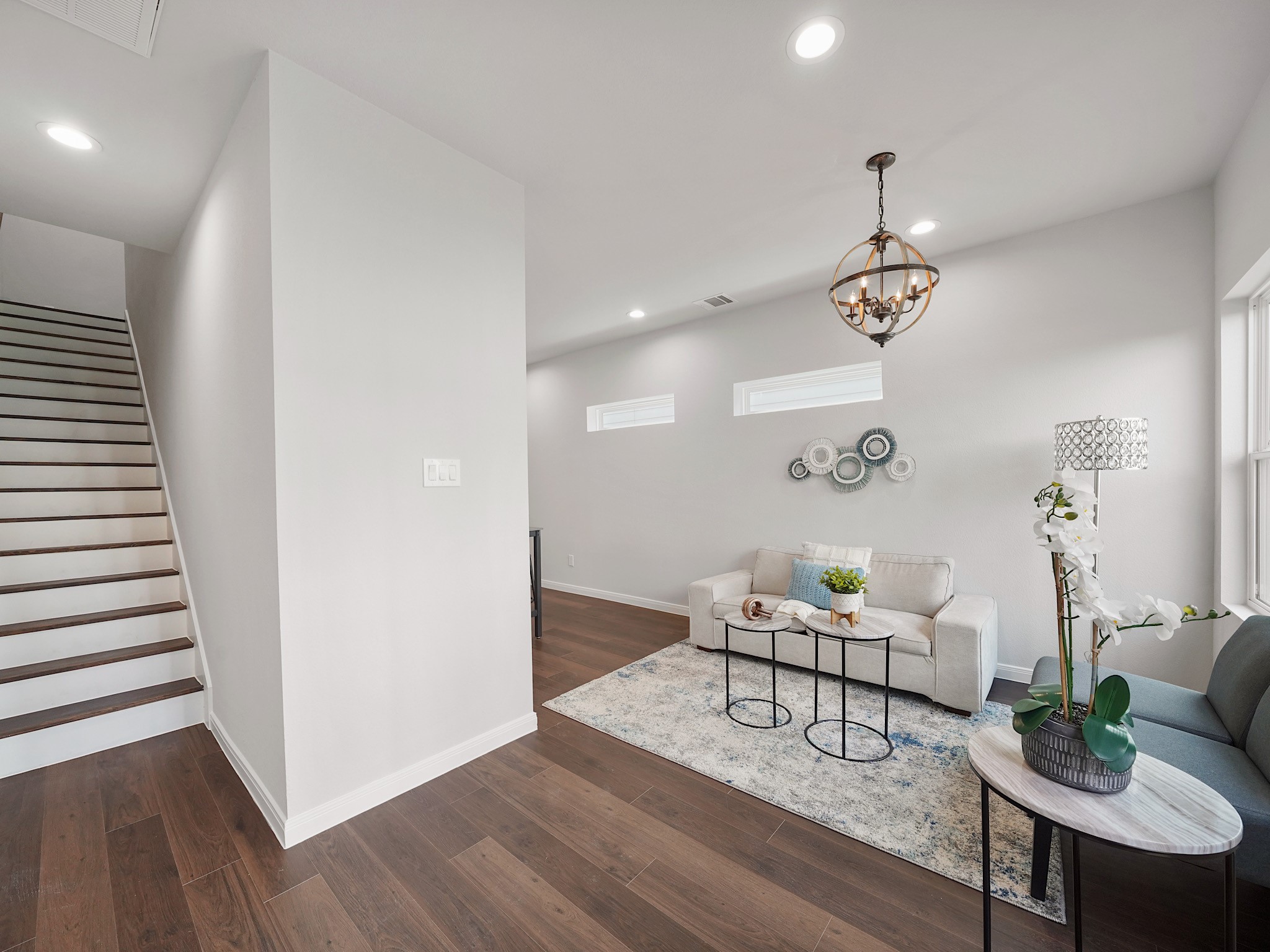 18846 Elegance Ave Spring Spring, TX 77379 - Photo 5 of 16 a living room with furniture and wooden floor